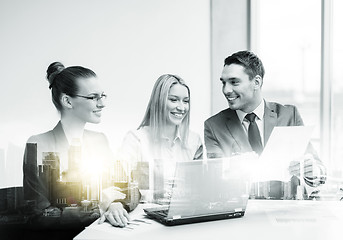 Image showing business team with laptop having meeting at office