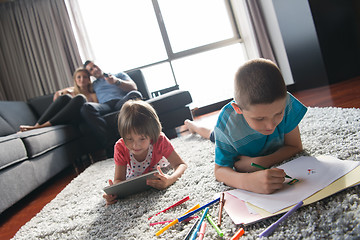 Image showing young couple spending time with kids