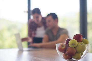 Image showing happy young couple buying online