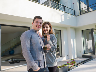 Image showing couple enjoying morning coffee