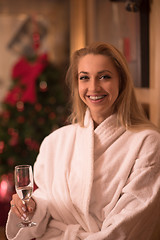 Image showing woman drinking champagne at spa