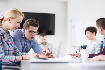 Image showing Two Business People Working With laptop in office