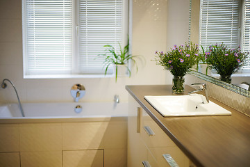 Image showing Bathroom interior with flowers