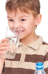 Image showing Little boy with plastic bottle of water