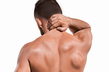 Image showing Studio shot of man with pain in neck