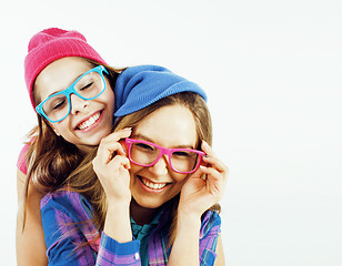 Image showing best friends teenage girls together having fun, posing emotional on white background, besties happy smiling, lifestyle people concept close up