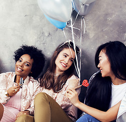 Image showing Lifestyle and people concept: young pretty diversity nations woman with different age children celebrating on birth day party together happy smiling, making selfie. African-american, asian and caucasi