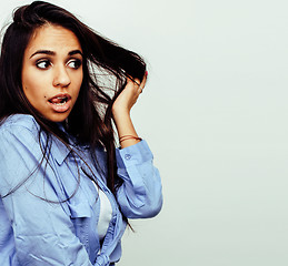 Image showing young happy smiling latin american teenage girl emotional posing on white background, lifestyle people concept 