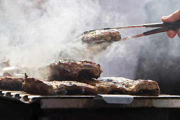 Image showing Grilled pork ribs on the grill