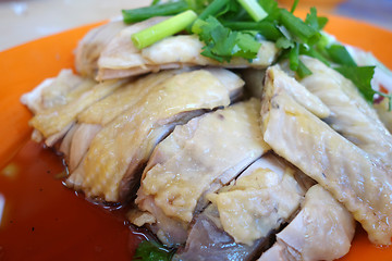 Image showing Boiled whole chicken cut into sliced portions