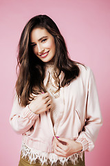 Image showing young cute disco girl on pink background smiling adorable emotions copyspace, lifestyle people concept