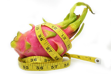 Image showing Dragon fruit and measure tape