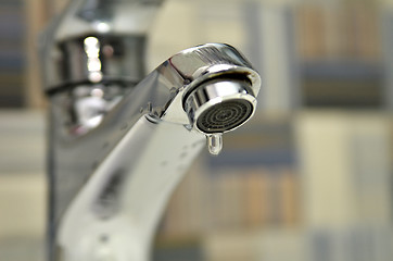 Image showing Bathroom tap leaking water drops