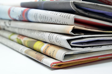 Image showing Newspapers folded and stacked