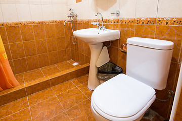 Image showing Bathroom combined with toilet in the hotel, shower, sink and toilet