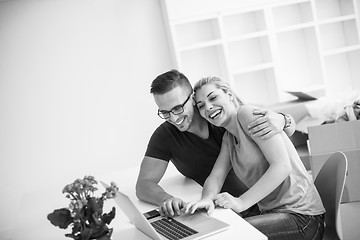 Image showing Young couple moving in a new home