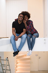 Image showing couple having break during moving to new house