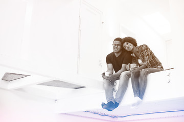 Image showing couple having break during moving to new house