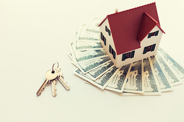 Image showing close up of home model, money and house keys