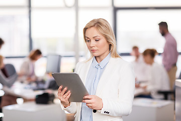 Image showing businesswoman with tablet pc computer at office