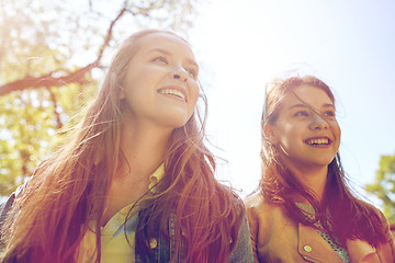 Image showing happy teenage student girls or friends outdoors