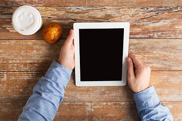 Image showing businessman hands with tablet pc and coffee