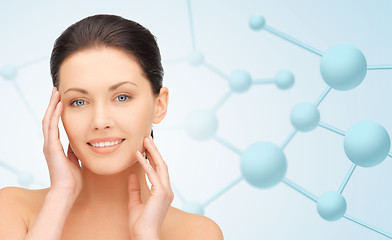 Image showing beautiful young woman face with molecules