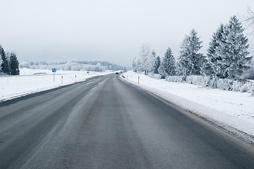 Image showing Highway in the winter, the trees covered with hoarfrost