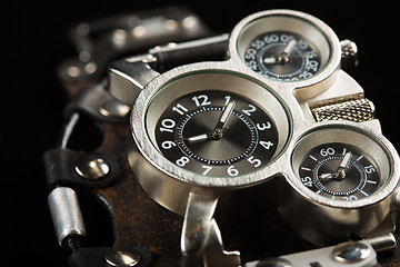 Image showing unusual watches. several alternatives dials