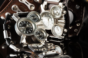 Image showing unusual watches. several alternatives dials