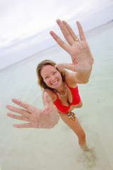 Image showing Woman with Sandy Hands