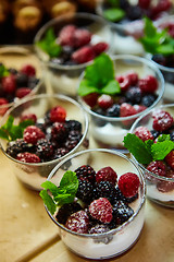 Image showing Blackberry and raspberry in the white yogurt.