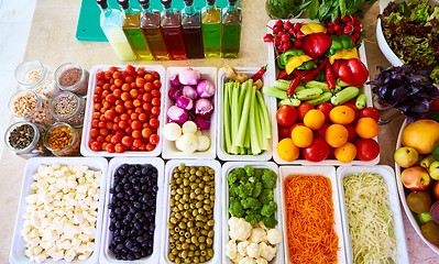 Image showing Salad Bar Fresh Vegetables sliced Top view Tomato Carrot Celery Cucumber Cherry tomato Sweet pepper.