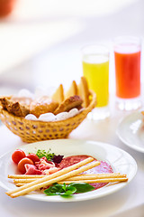 Image showing delicious breakfast for two at the luxury hotel.