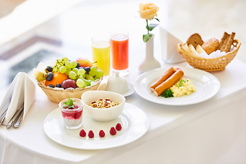 Image showing delicious breakfast for two at the luxury hotel.