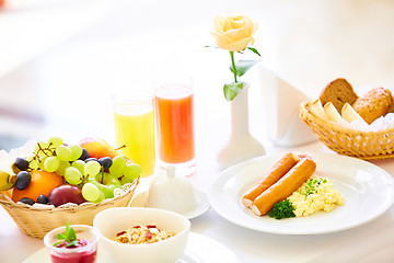 Image showing delicious breakfast for two at the luxury hotel.