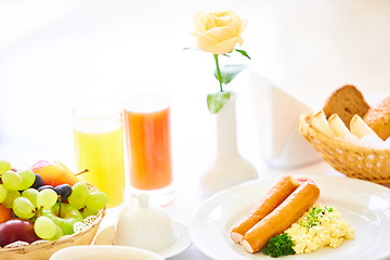 Image showing delicious breakfast for two at the luxury hotel.