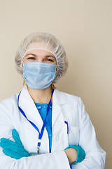 Image showing Young woman wearing mask, gloves