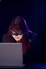 Image showing Mugger woman in black mask