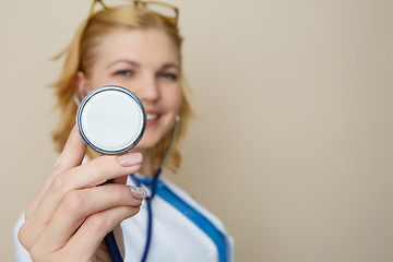 Image showing Girl in glasses with phonendoscope