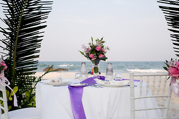 Image showing Covered table on sea shore