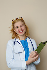 Image showing Doctor girl with green folder