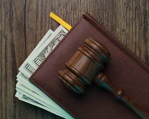 Image showing Judge\'s hammer, folder with money