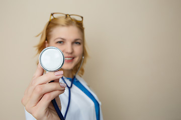 Image showing Beautiful doctor in medical dressing