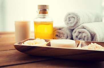 Image showing close up of soap, himalayan salt and scrub in bowl