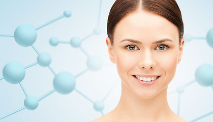 Image showing beautiful young woman face with molecules