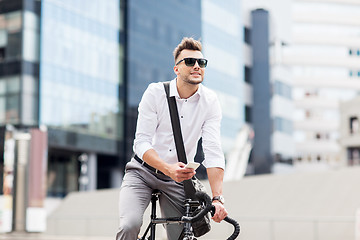 Image showing man with bicycle and smartphone on city street