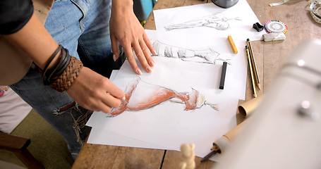 Image showing Crop shot of female drawing sketch