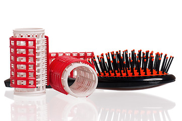 Image showing Hair curlers and hairbrush