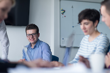 Image showing Group of young people meeting in startup office